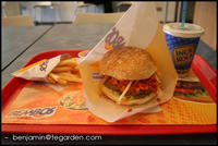 Peruvian fast food: a hamburger with egg, potato strips, and sausage