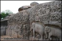 A wall of deep relief carving