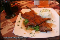 A traditional Peruvian meal: cuy (guinea pig) and chicha morada (a drink made from purple maize)